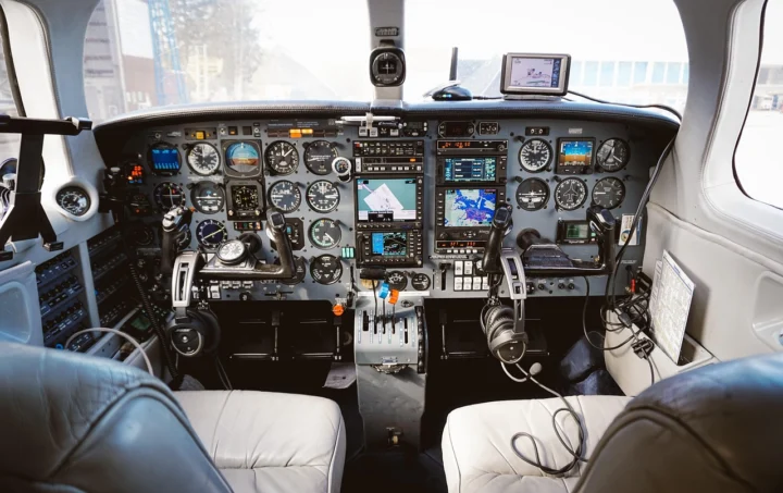 Close-up of airplane cockpit flight instruments and displays